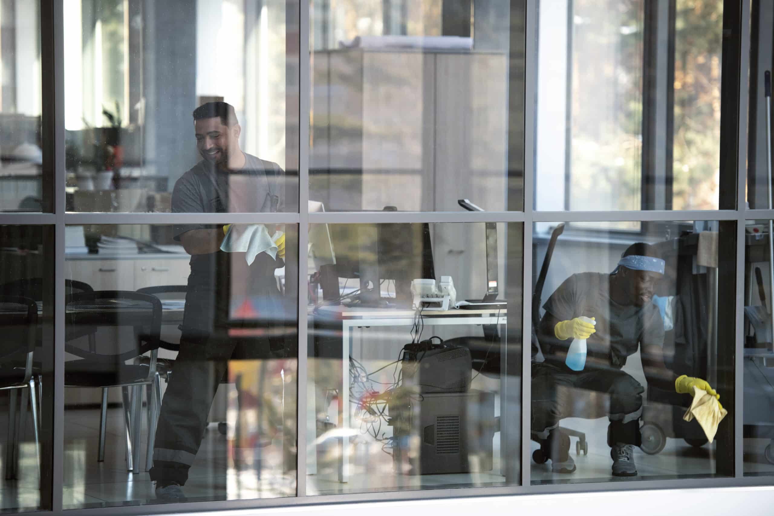 full-shot-smiley-man-cleaning-window